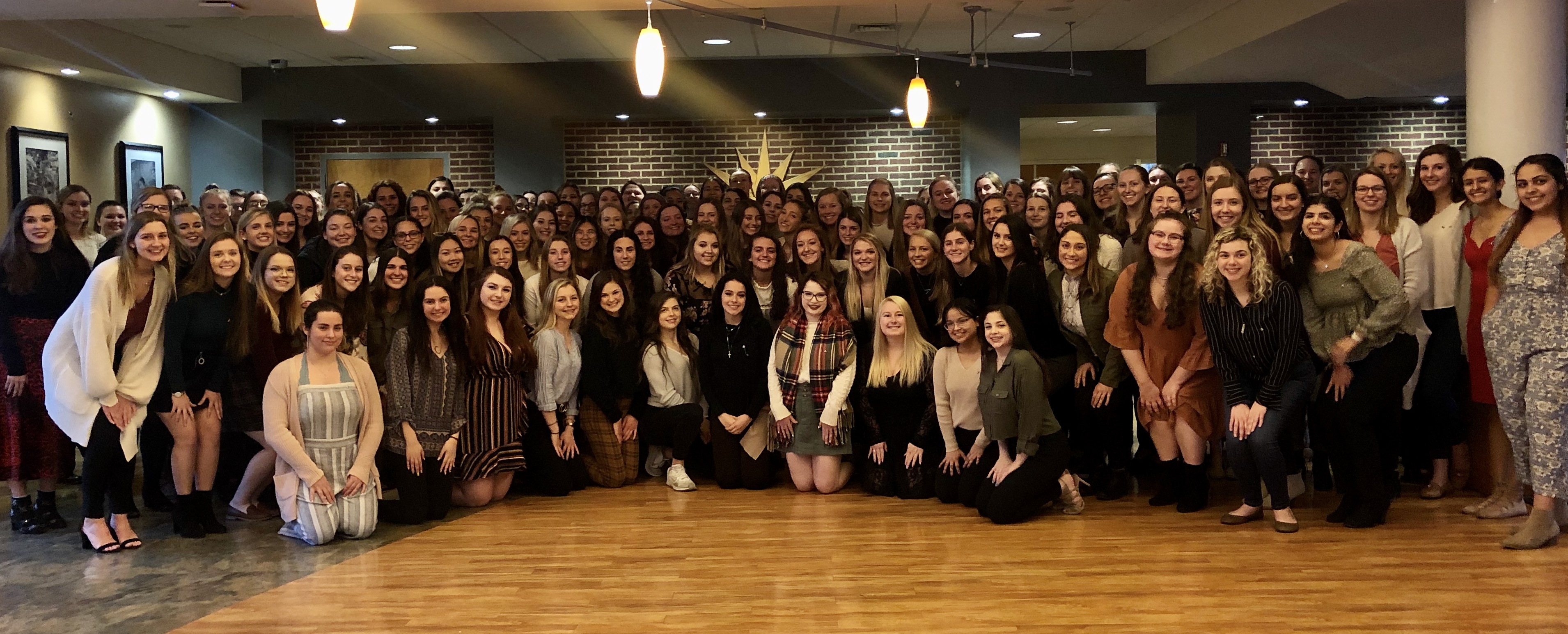 Group photo of sorority women during Panhellenic Badge Day