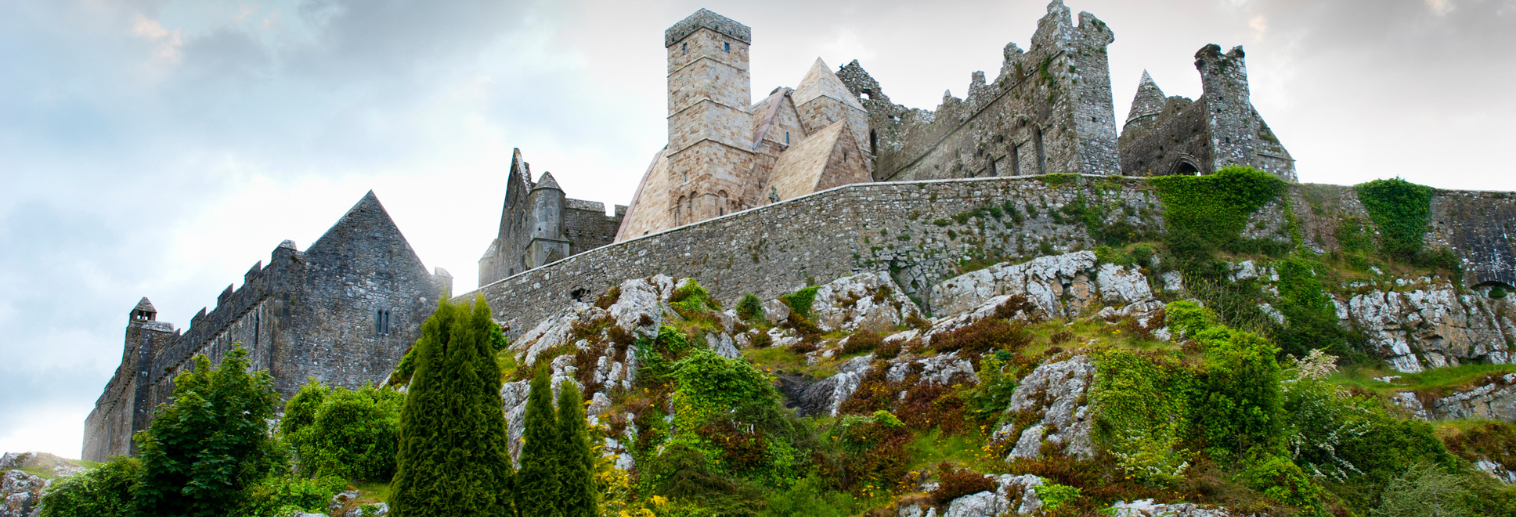 Landscape of Irish castle on a hill.