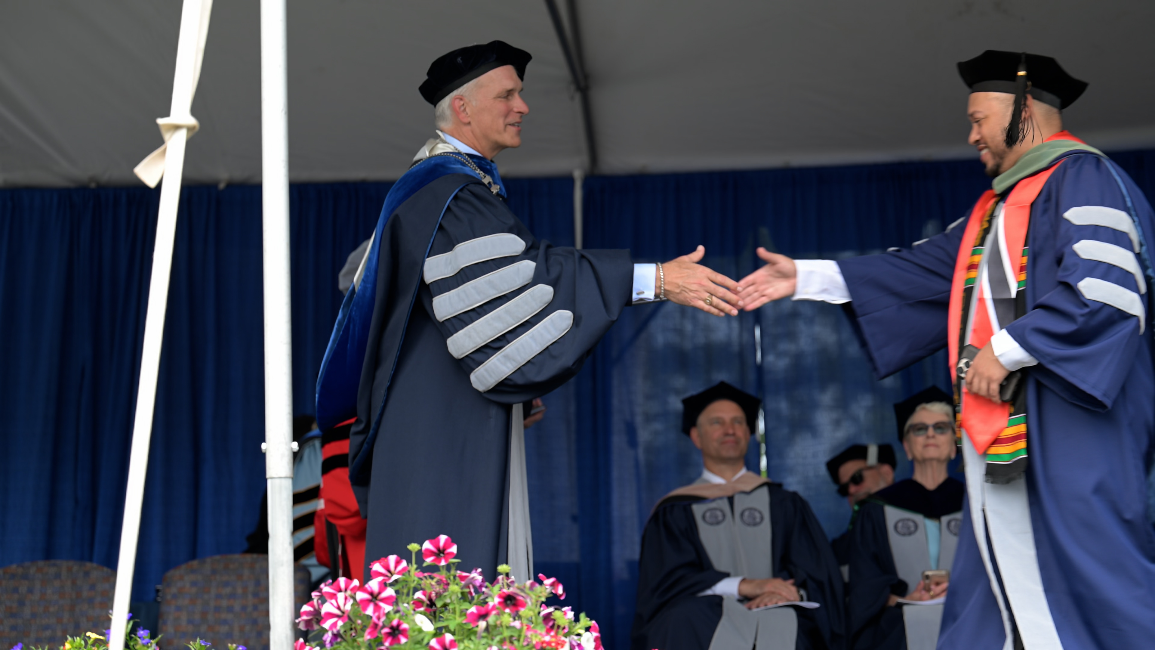 Commencement hand shake