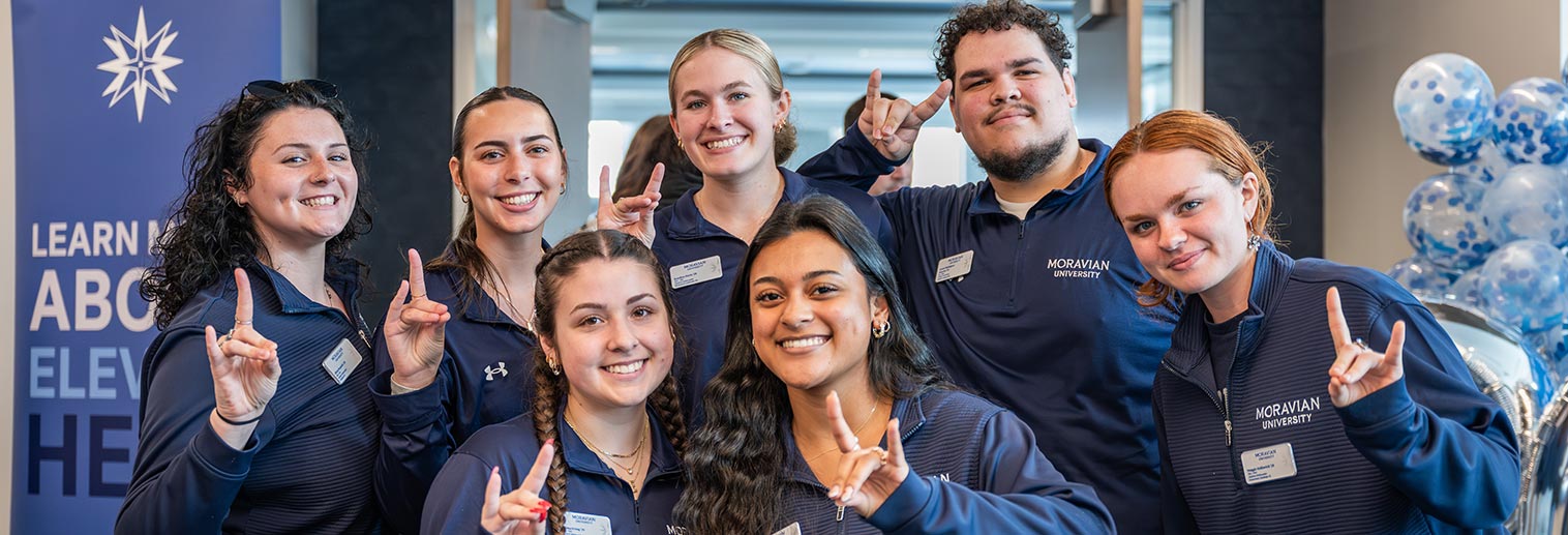 26 point students at an admissions event
