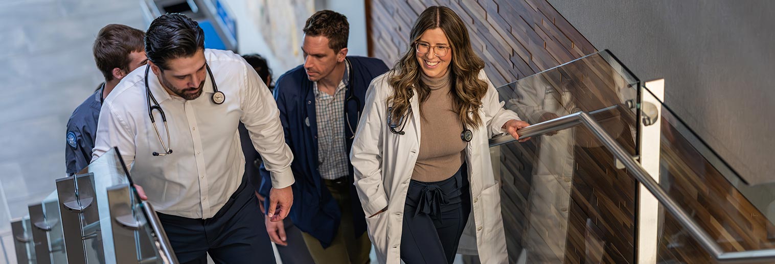 Nursing students on staircase