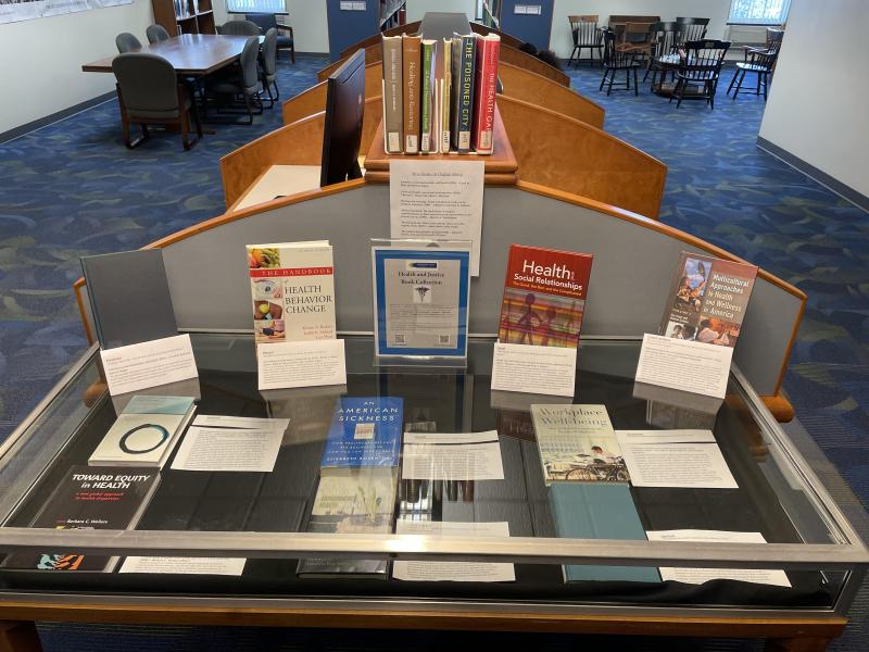 A shot of the Reeves Library display, complete with posters and images sorrounding the Health and Justice theme.