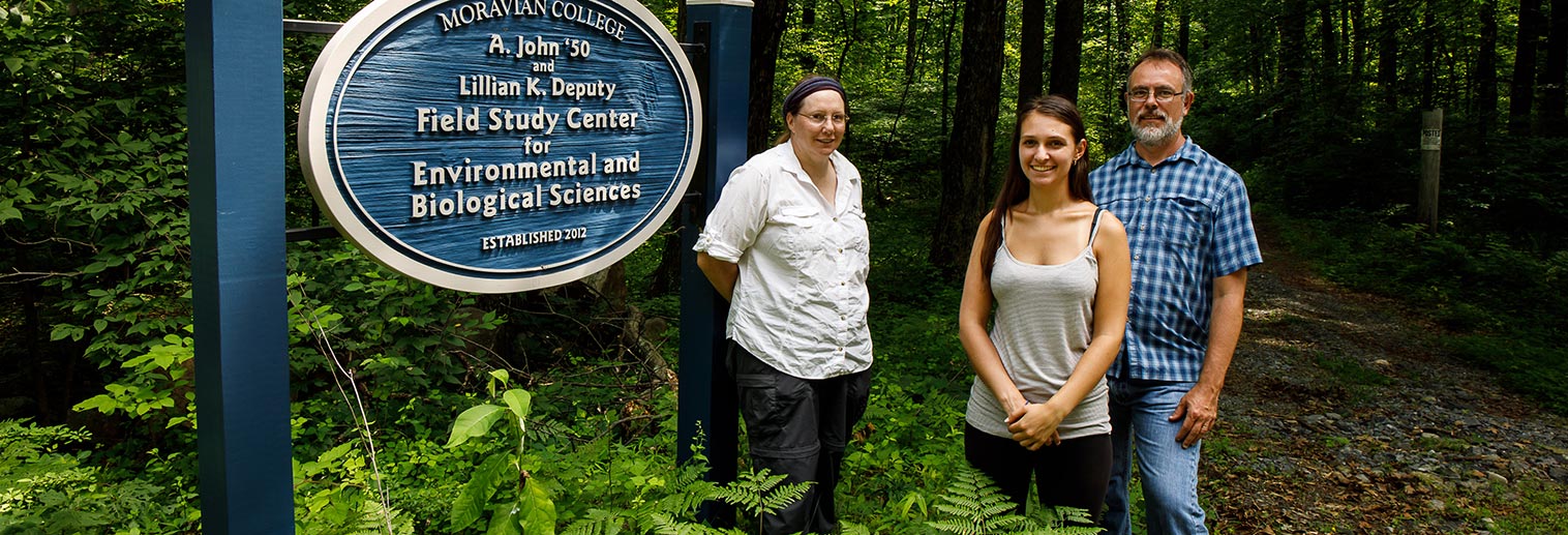 Brielle standing with Dr. Bardsley and Dr. Paxton