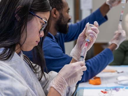 Student practicing IV skills