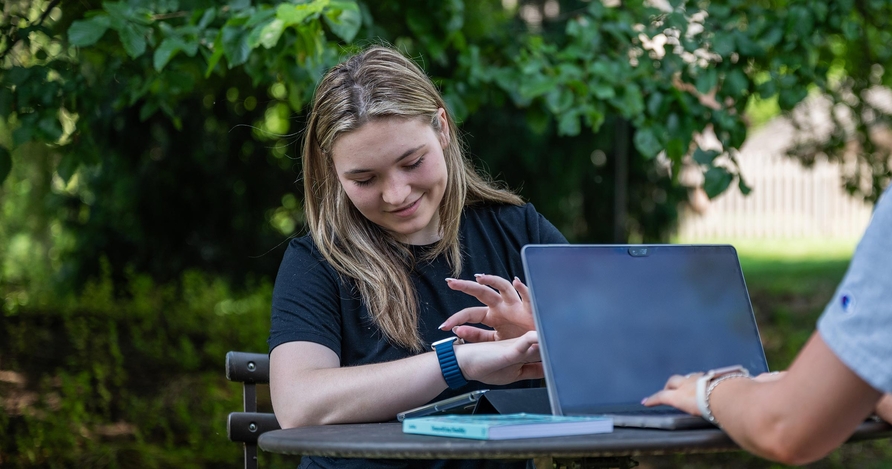 Student using smart watch