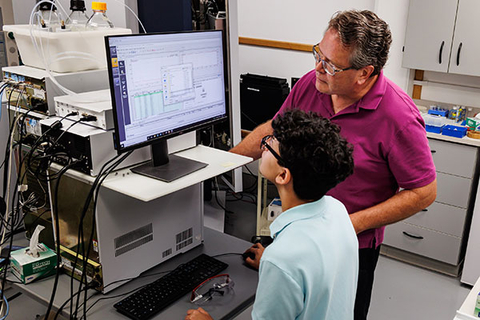 Dr. Dunham with student