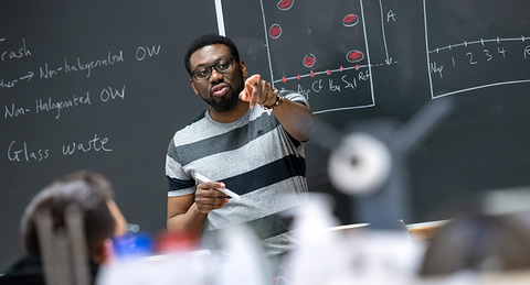 Prof teaching chemistry class