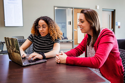 Prof. Payton with student