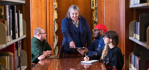 Freda teaching in library