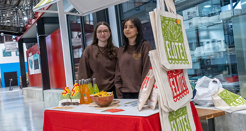 Art majors behind food cart they designed