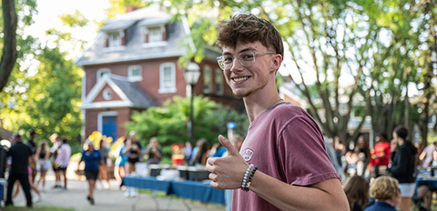 Student giving thumbs up