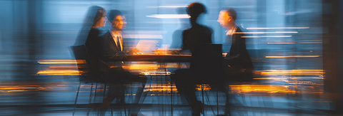 Traders sitting at a table