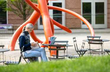 Student sitting outside