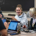 Student in class using laptops